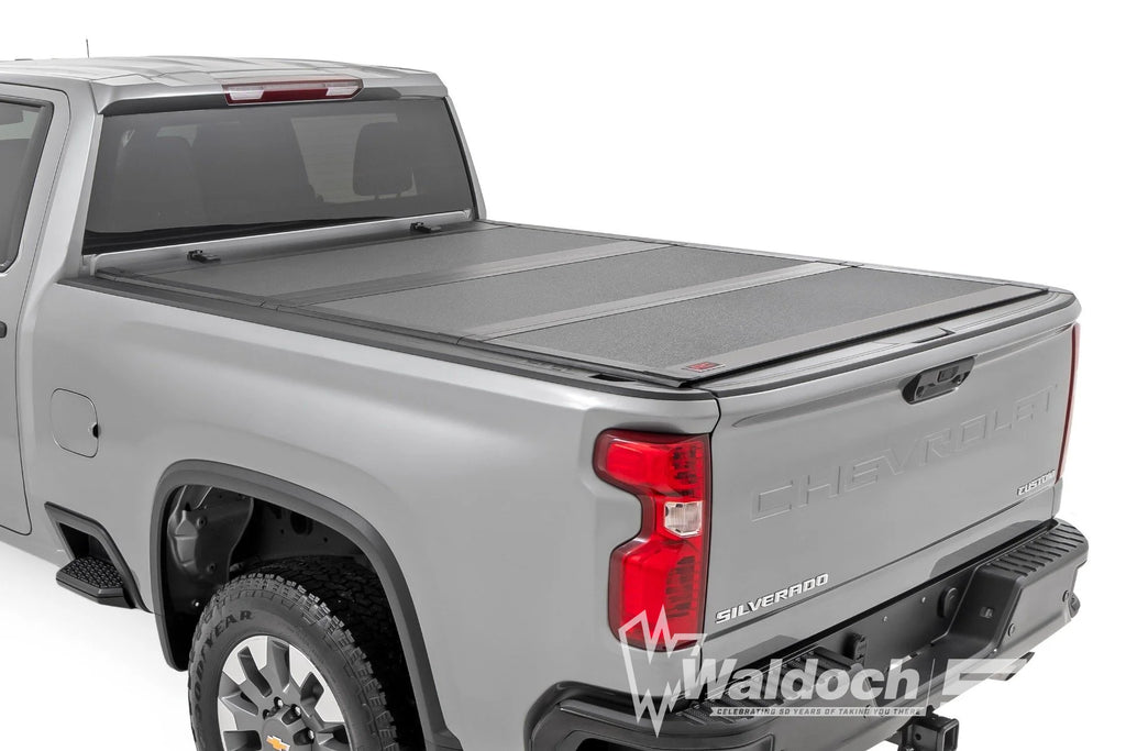 Hard Tri-Fold Flip Up Bed Cover | 6'9" Bed | Chevy/GMC  Silverado/Sierra 2500HD/3500HD (20-25)