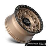 KM545 17X9 6X5.5 M-BRZ BLK LP 00MM