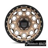KM545 17X9 6X5.5 M-BRZ BLK LP 00MM