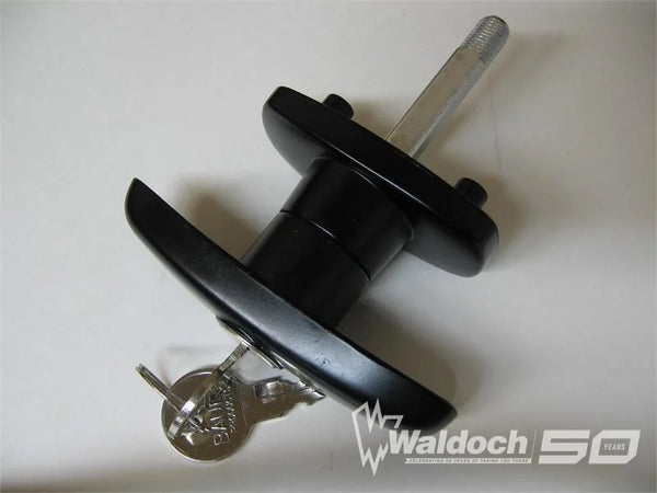 Statewide Framed Door, Black Screw Mount T Handle Counter Clockwise Turn, Keyed 127, Thick Base Used Exclusively On Cap Doors Manufactured by Statewide Aluminum. Dust Cover On Lock Cylinder. 1/2" Thread On Shank.
