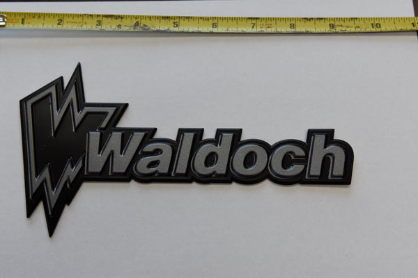 WALDOCH LOGO WITH W (SL24) BLACK BACKING WITH DARK GREY LETTERS 4.20" X 8"